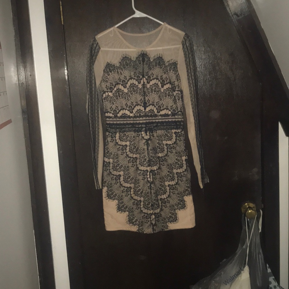 Nude and black lace mini dress